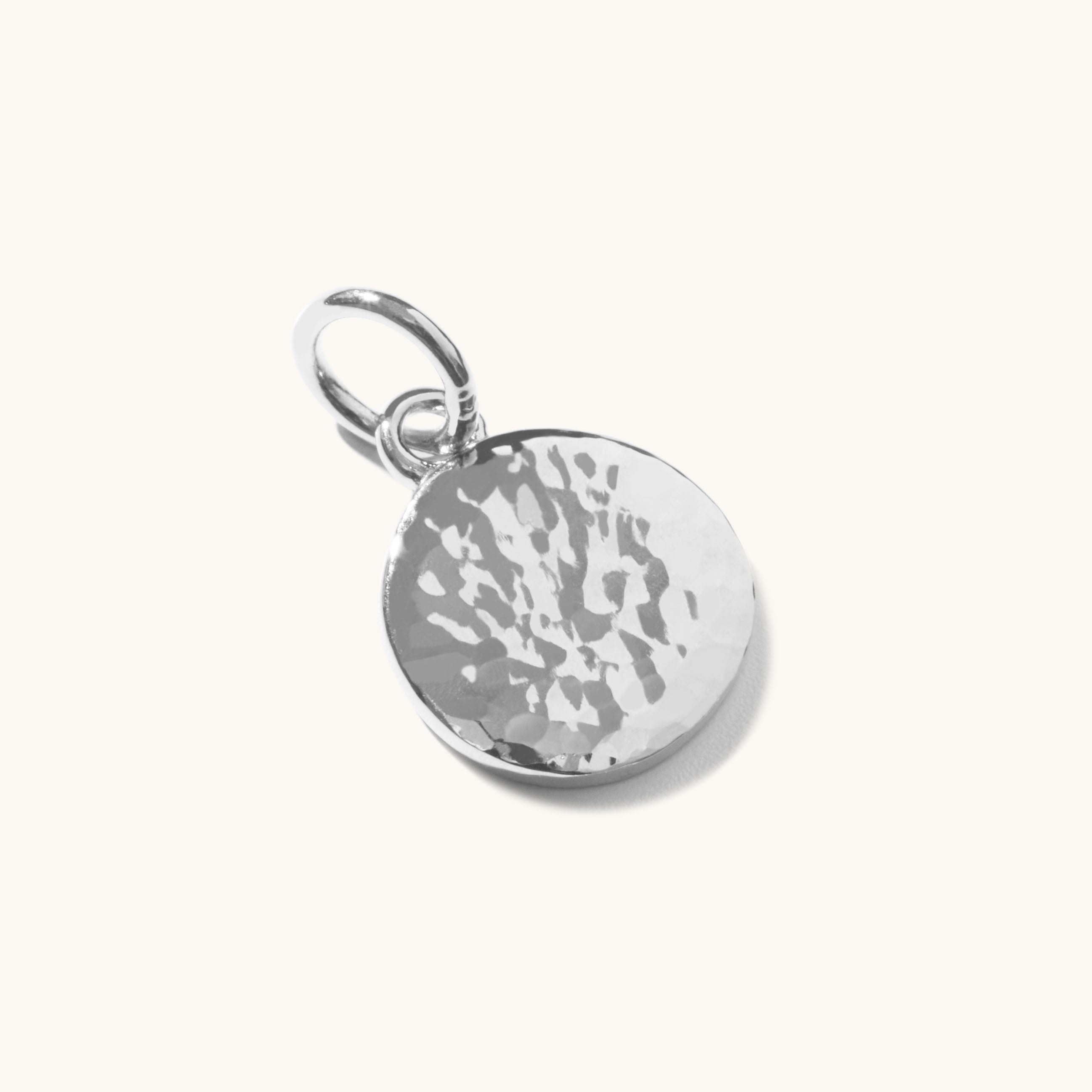 Muru Hammered Disc riipus hopea kaiverrettava