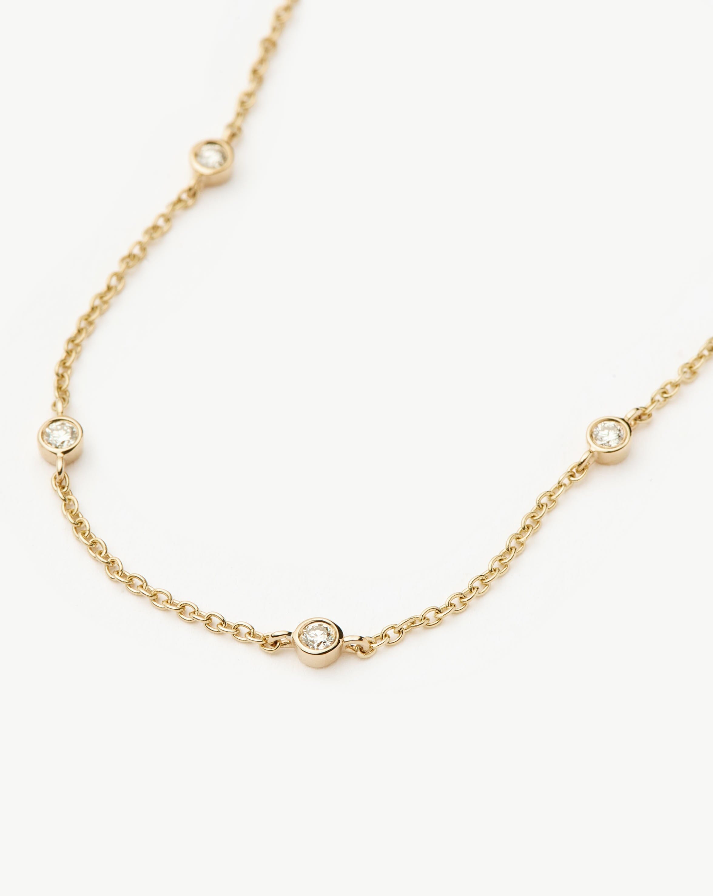 Missoma Solid Gold Floating Diamond rannekoru 14k