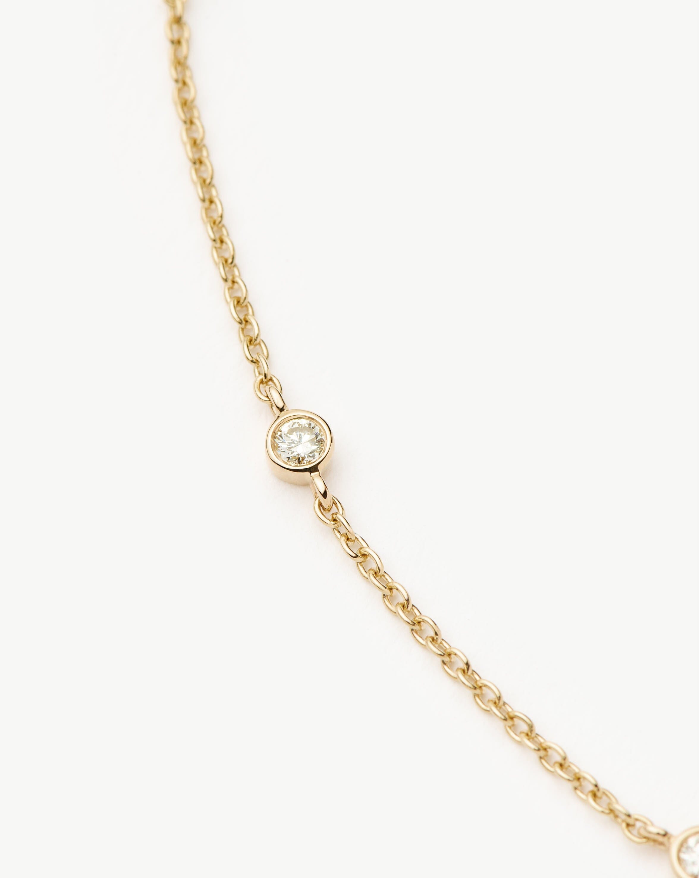 Missoma Solid Gold Floating Diamond rannekoru 14k